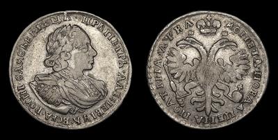 Полтина 1721 года. Тип 1720-1721 годов, т.н. «Бюст в супервесте». Лавровый венок по краю окружности
